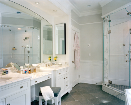 Off the second-floor central hall, the master suite consists of a bedroom, dressing room, master bath (pictured) and a large study. 