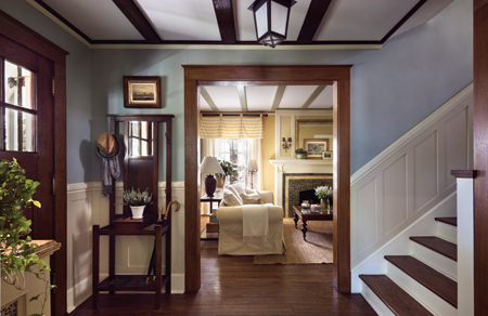 To lighten the atmosphere of the ground-floor entry, Brewer, working with interior sytlist Brice Gaillard, replaced missing beams, painted the woodwork and chose a Farrow & Ball painting scheme that highlights the original features. Photo: © Francis Dzikowski / Esto 