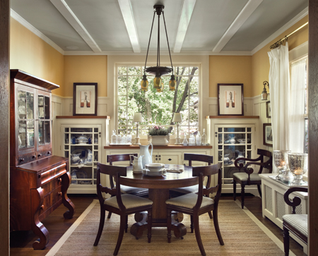 Brewer replaced the dining room’s existing piano window, and installed new beams, wainscot, and light fixtures from Rejuvenation. He also designed a new built-in buffet in which to store his collection of antique English transfer ware. Photo: © Francis Dzikowski / Esto 