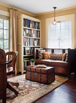 The study overlooks the porch and features new bookcases for Brewer’s large collection of books on architecture and interior design, as well as artifacts culled from antique stores and flea markets. Photo: © Francis Dzikowski / Esto 